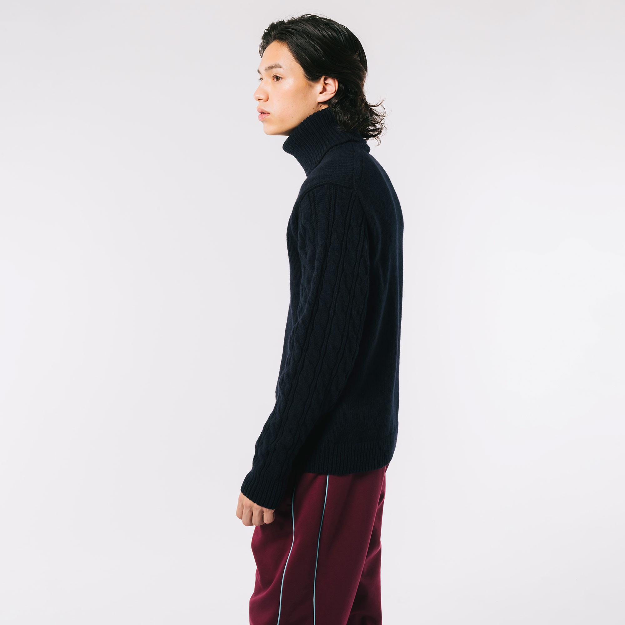 アシンメトリータートルネックニットセーター