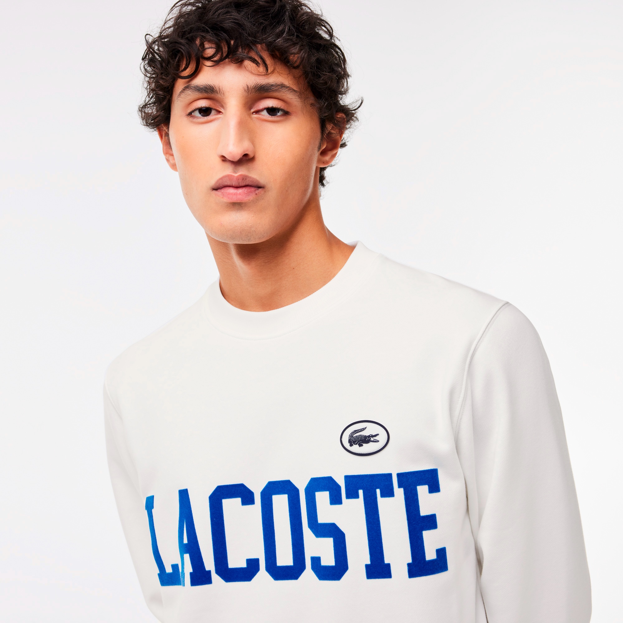 フロッキーカレッジロゴクルーネックスウェット