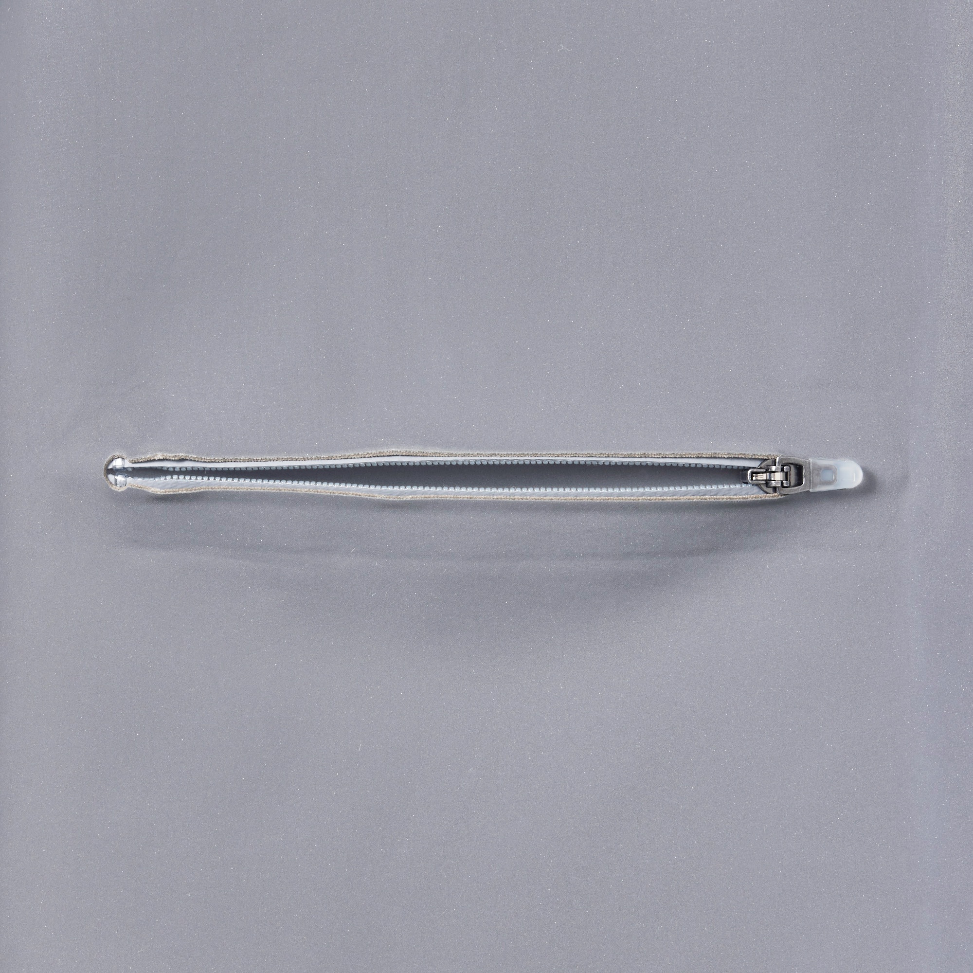 『FW25 Fashion Show』リフレクティブトラックジャケット