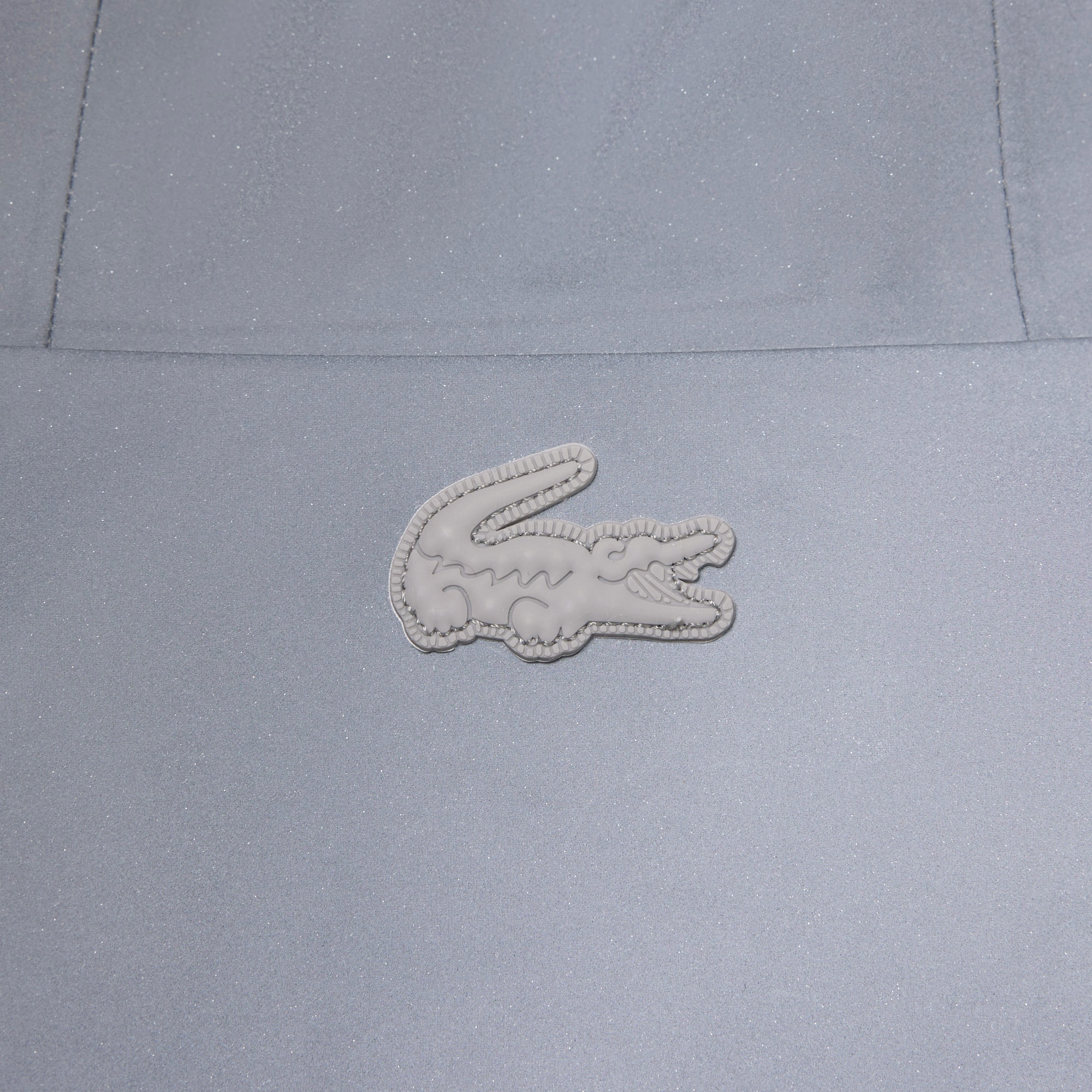 『FW25 Fashion Show』リフレクティブトラックジャケット