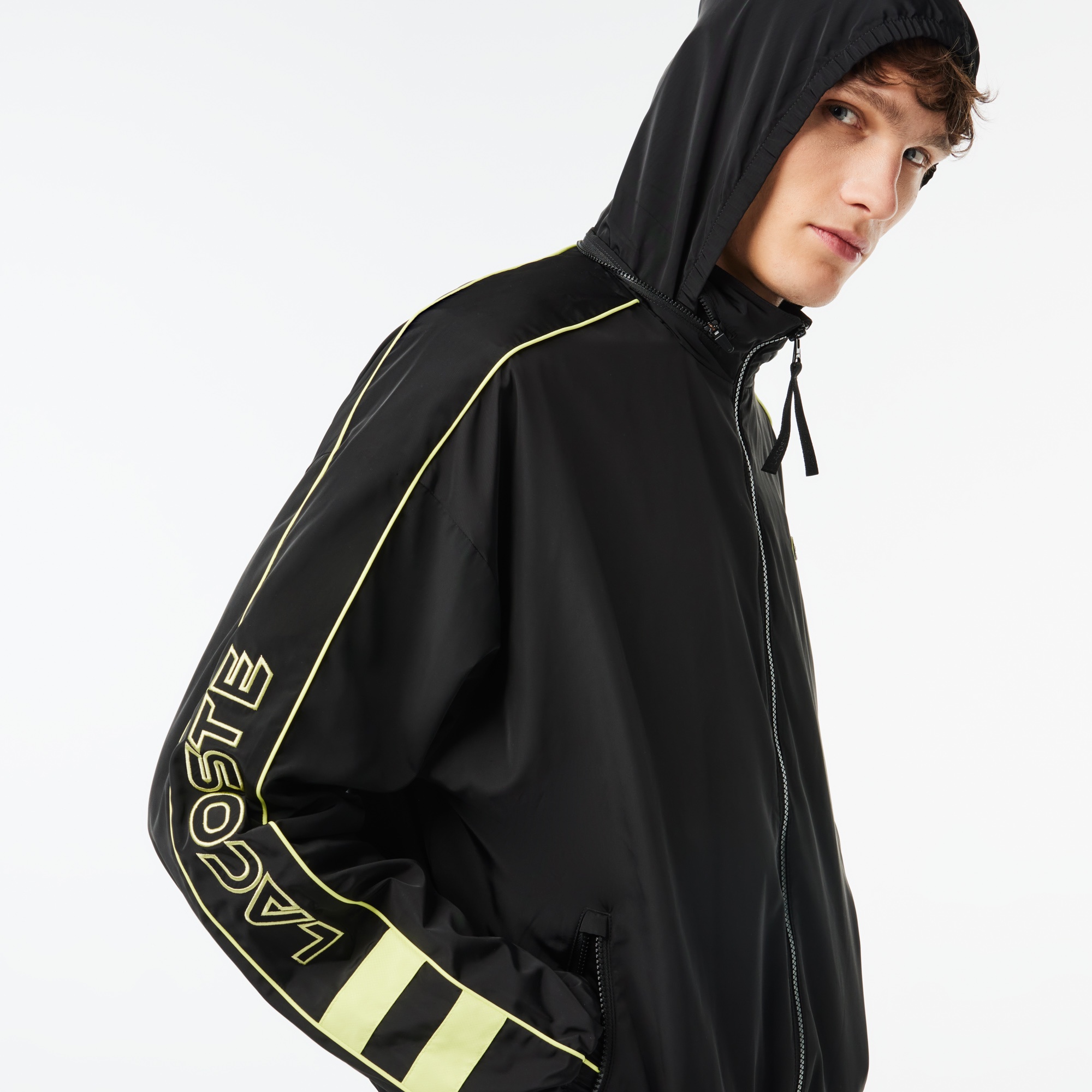 アシンメトリースリーブシャワープルーフトラックジャケット