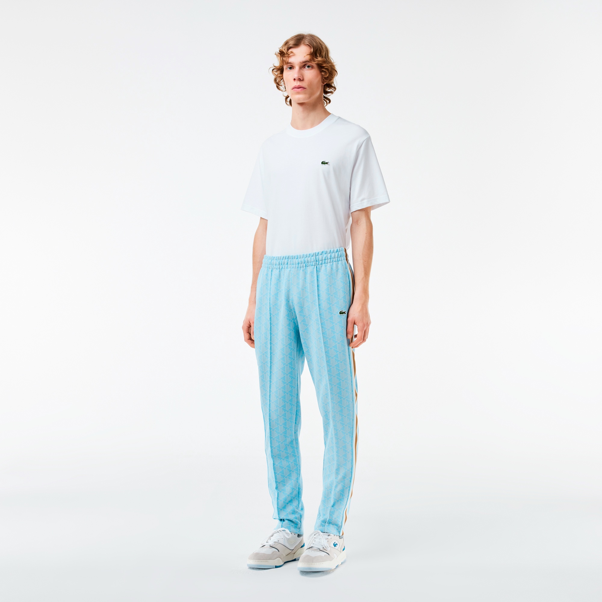 ラコステ LACOSTE ライン入り 幾何学模様トラック ジャージパンツUS M ラコステ LACOSTE ライン入り 幾何学模様トラック ジャージ