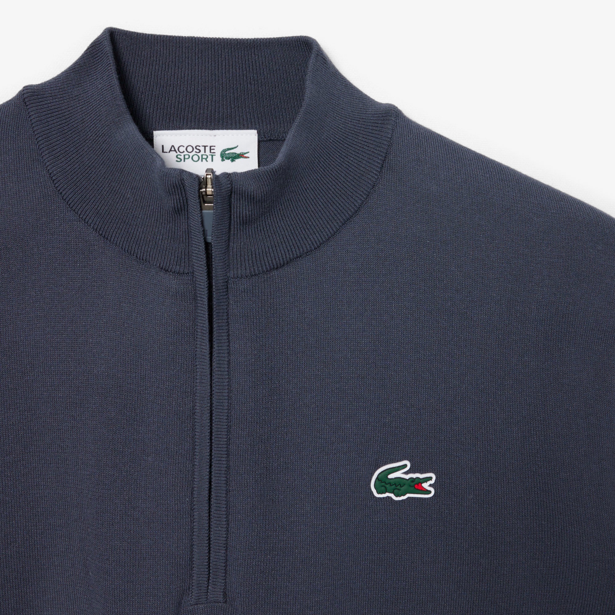 ヒートレギュレーティングハーフジップゴルフニット