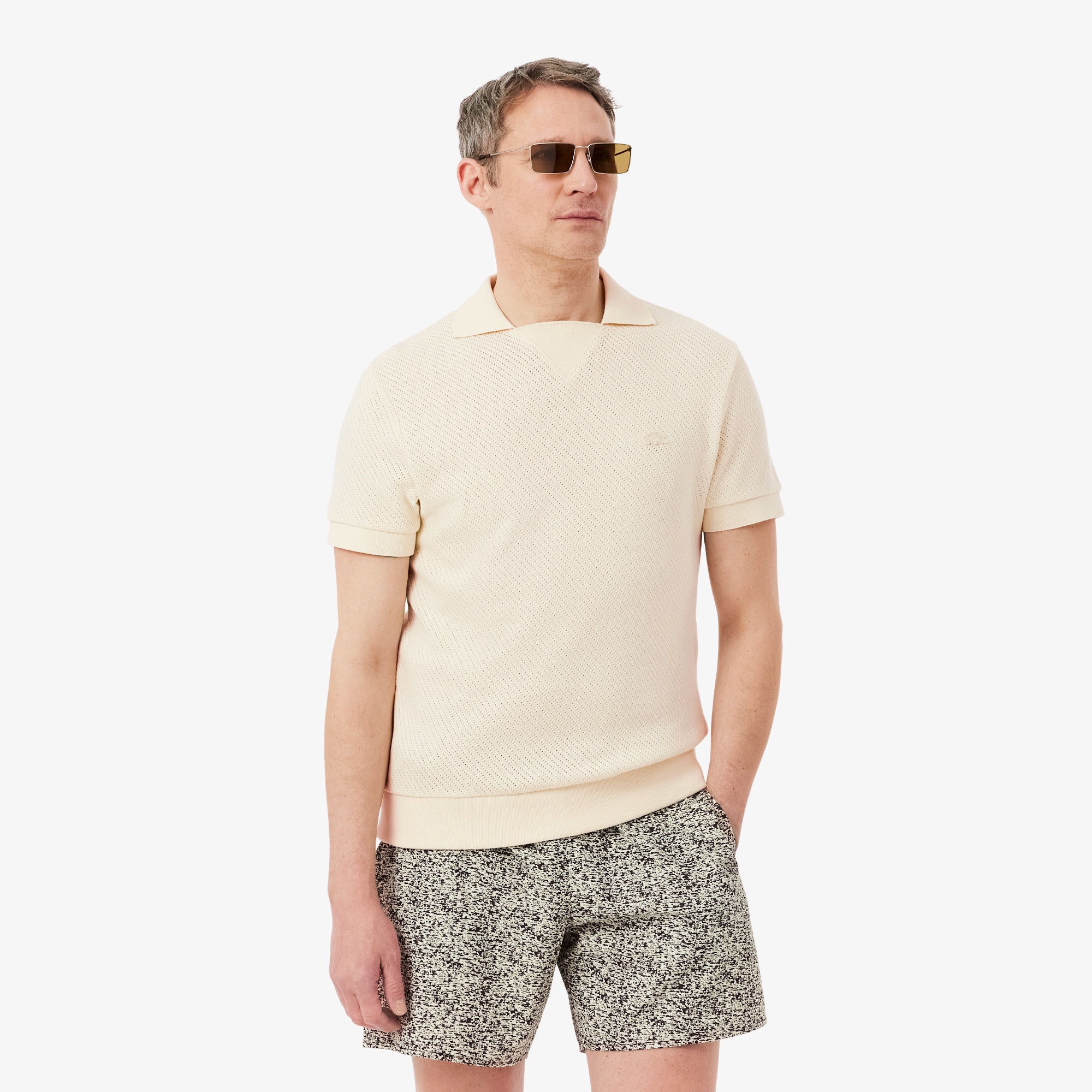 メッシュニットボタンレスポロシャツ