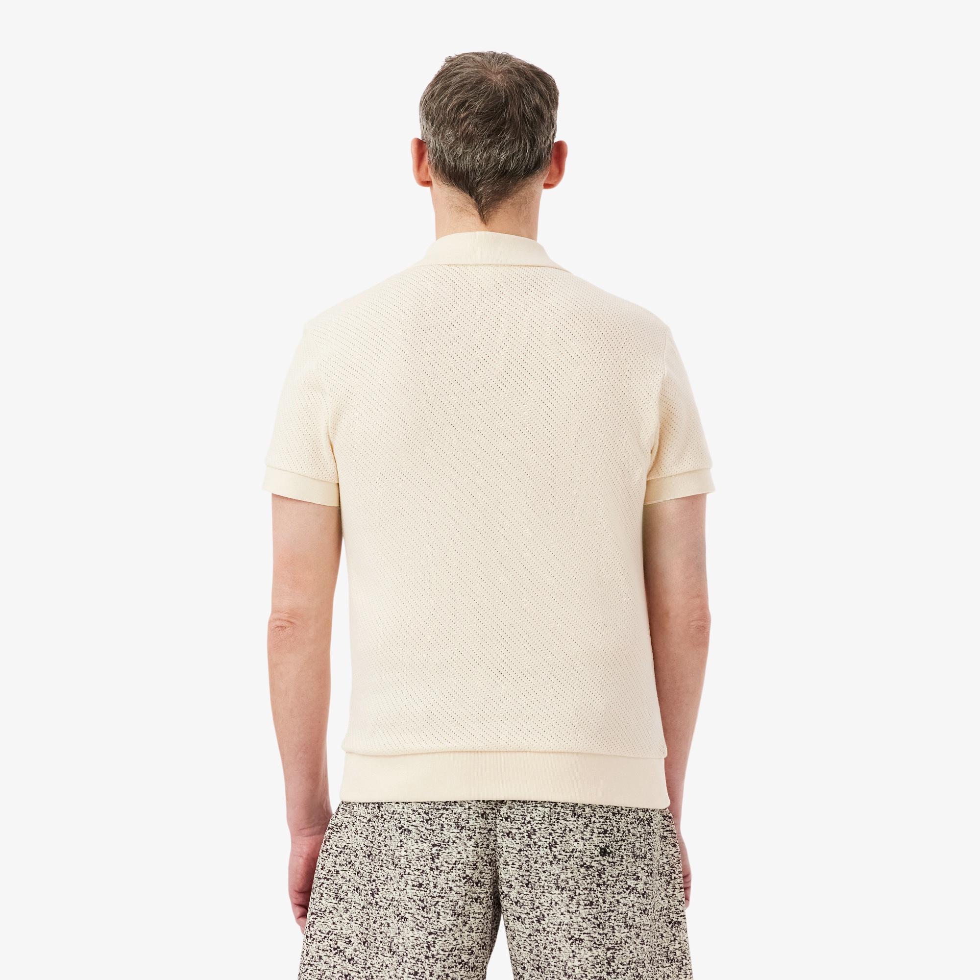 メッシュニットボタンレスポロシャツ