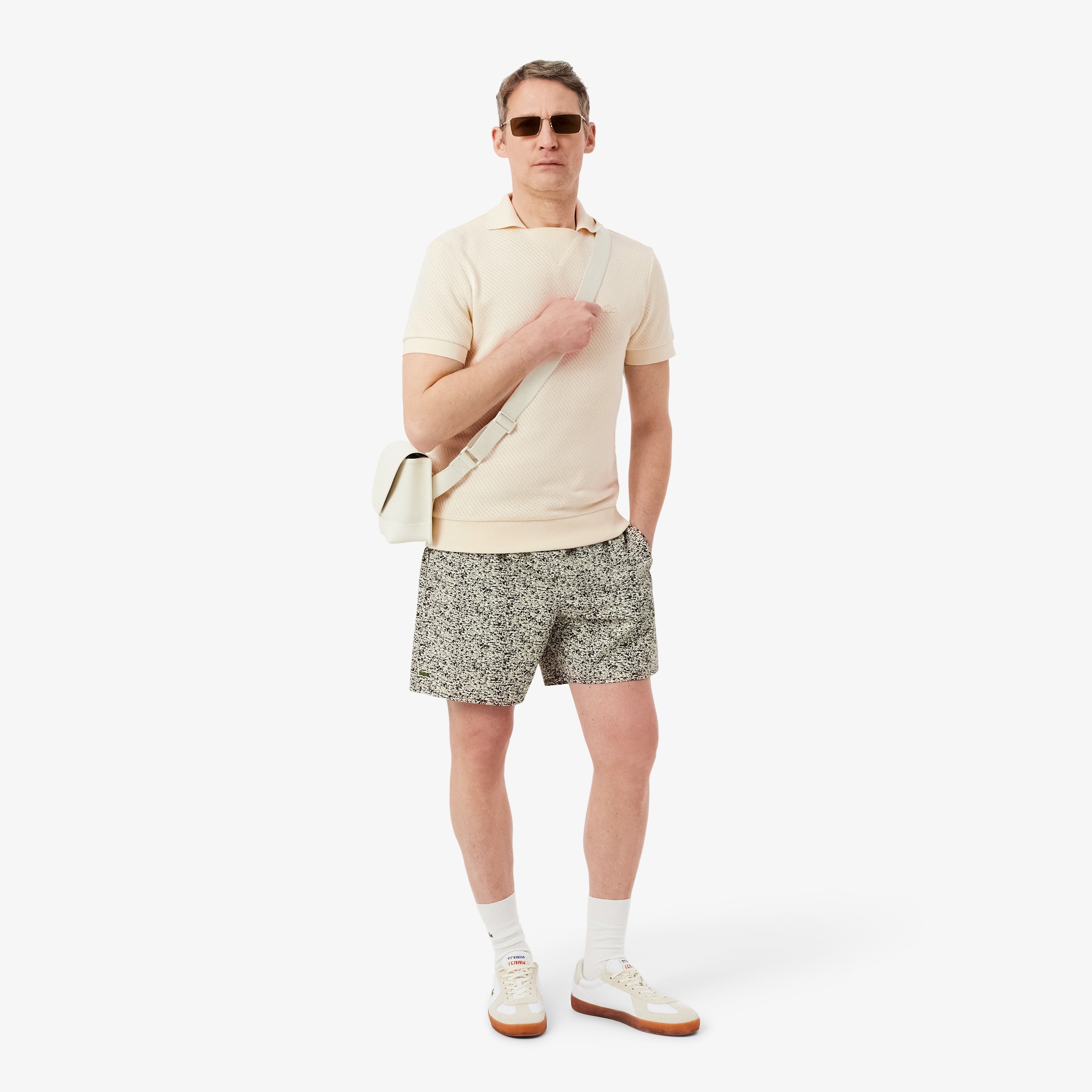 メッシュニットボタンレスポロシャツ